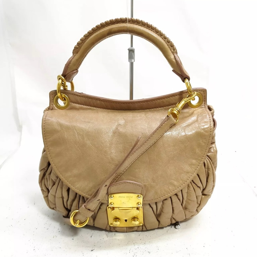 Miu Miu Coffer Tan Leather Handbag and crossbody bag